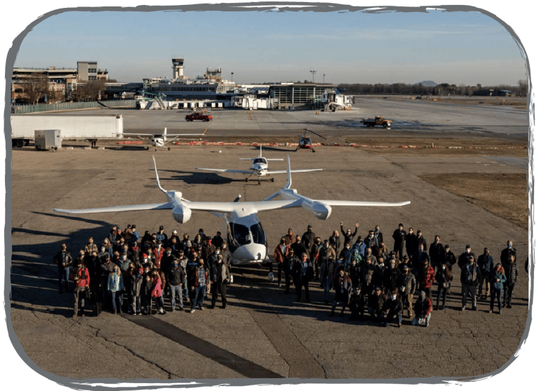 A shot of the team with BETA's first aircraft